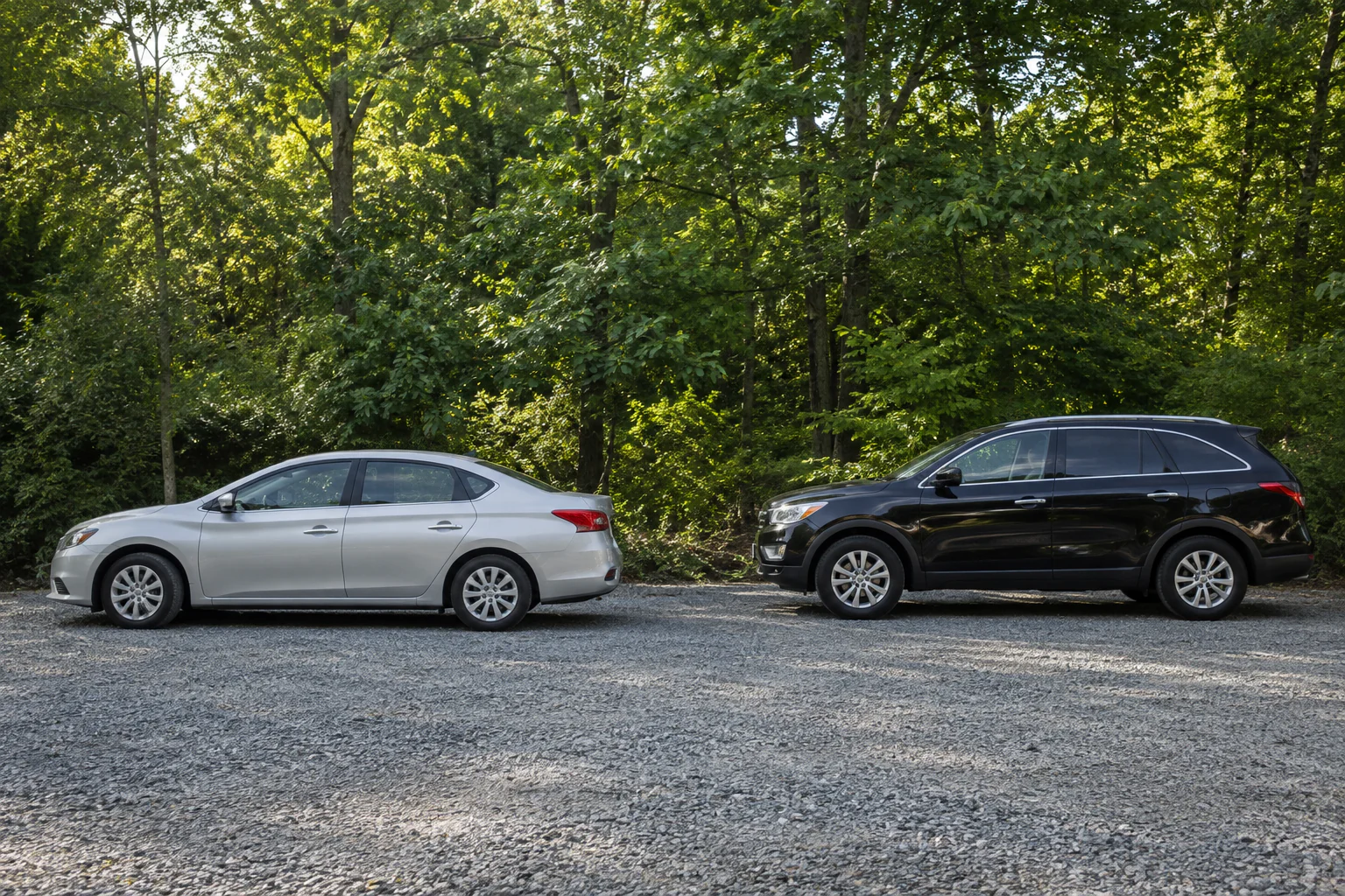 Passenger vehicles parked beside a suburban road
