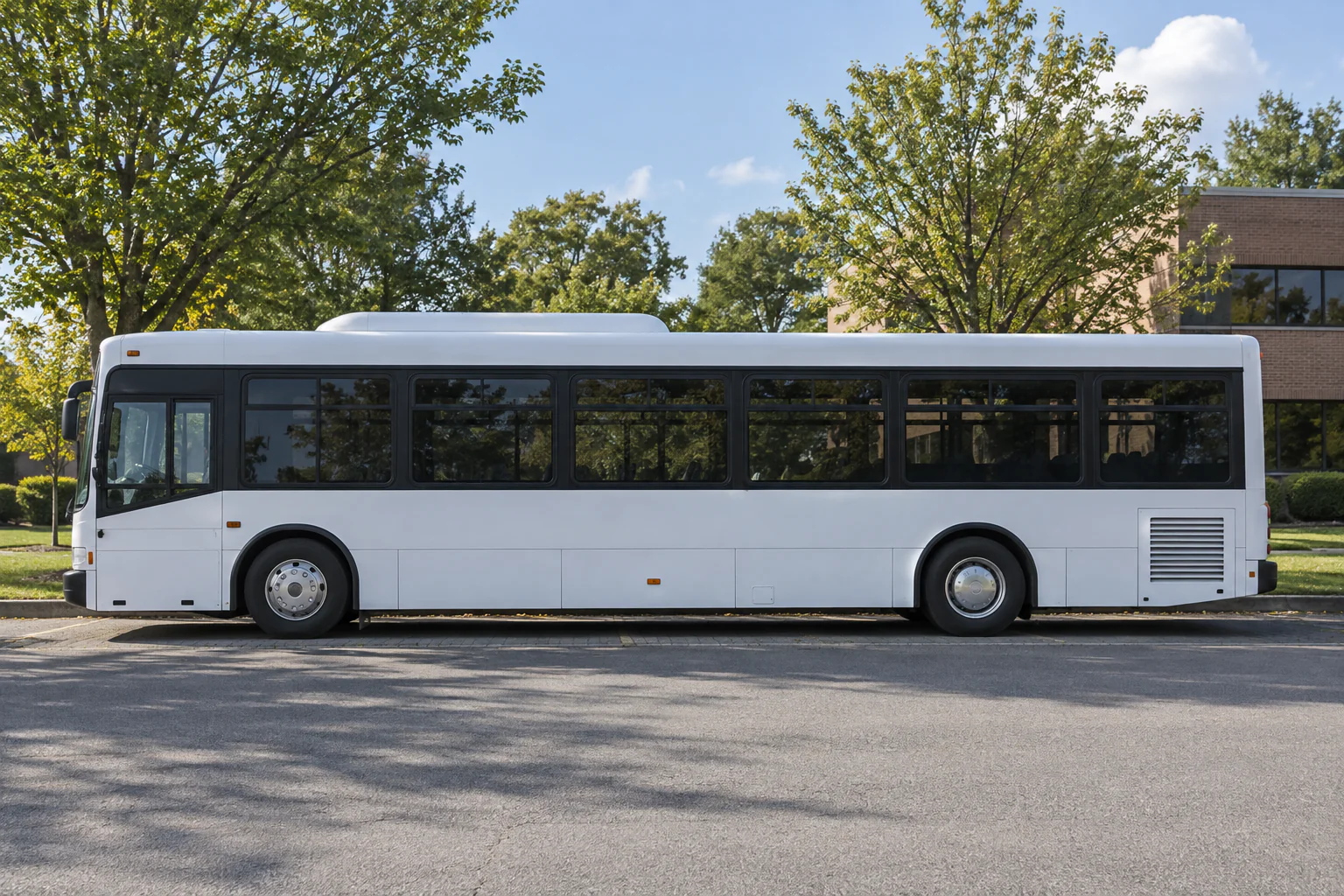 Unmarked commuter bus at a suburban stop